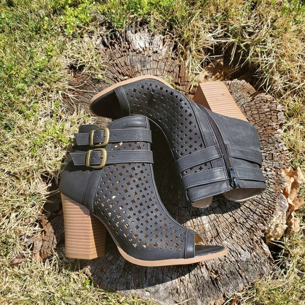Lightly worn black booties by Brash